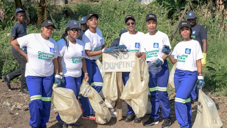 Group of black woman in cleaning outfits.