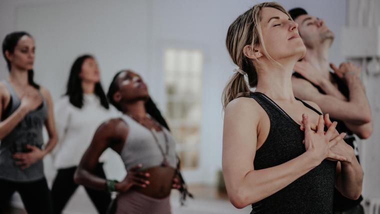 People doing yoga.