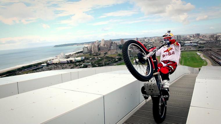 Man performing a trick on a motorbike